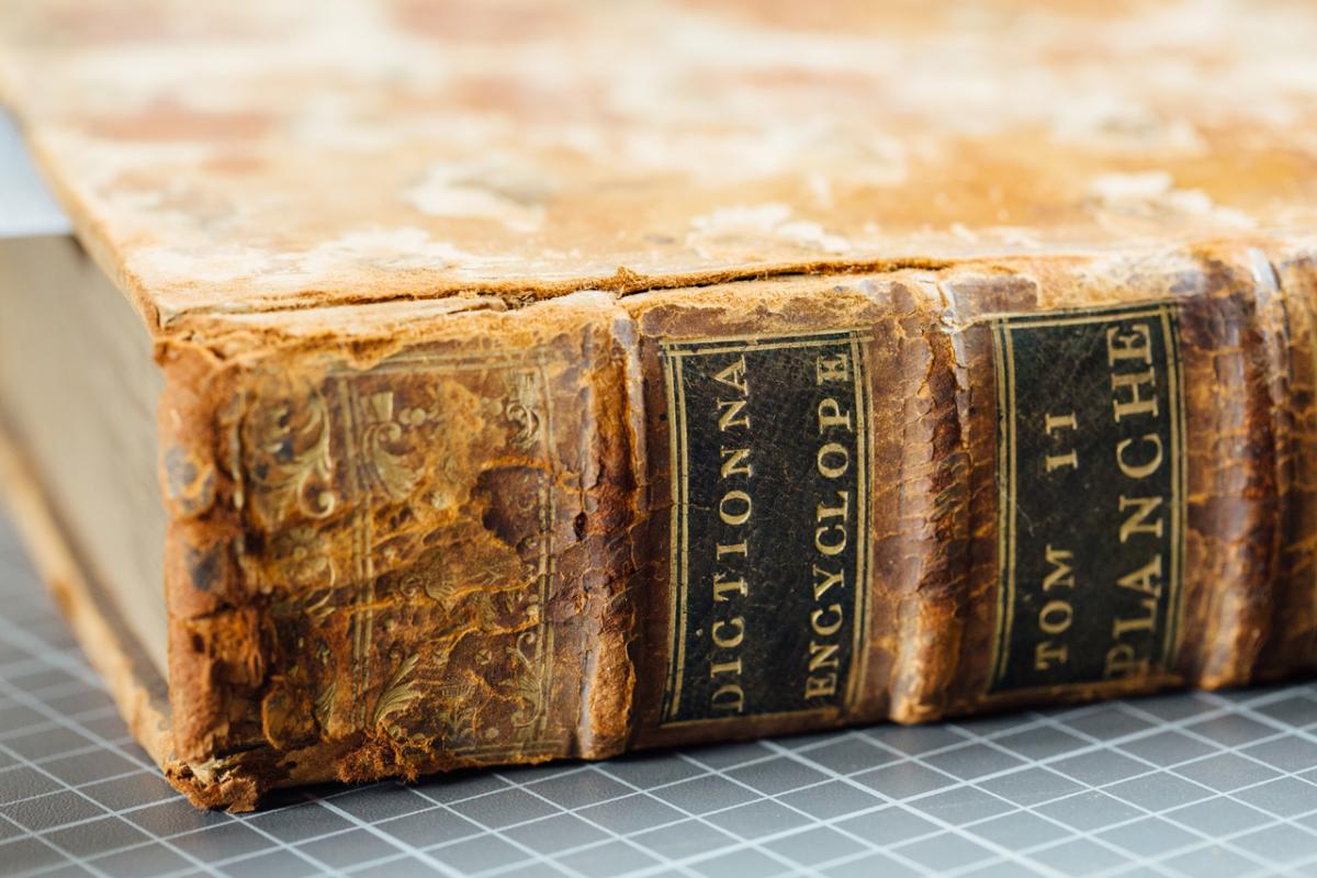 A photo of an old book.